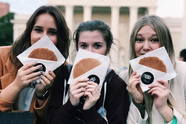 ILP Volunteers eating stroopwafel